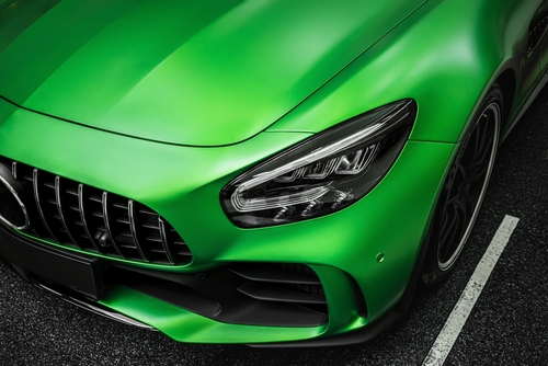 How does GPS tracking improve luxury car shipping